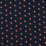 Punto de algodón con estampado de burbujas marrón y lunares azul marino