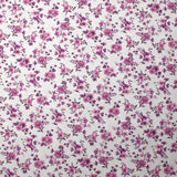 Piqué de coton imprimé les fleurs de Louna violet fond blanc