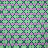 Popeline enduite imprimée pois & trèfle violet fond vert