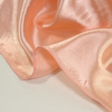 Crêpe satin polyester rose clair