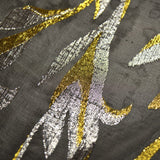 Mousseline de Soie noir Lys jacquard tissées or et argent