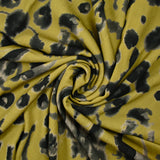 Printed viscose crepe with blotter effect, khaki background