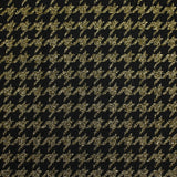 Gold houndstooth wool blend tweed on black background