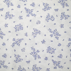 Coton imprimé petite brousse bleu fond blanc