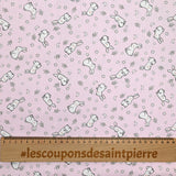 Piqué de coton imprimé jeune lapin fond rose clair