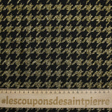 Gold houndstooth wool blend tweed on black background