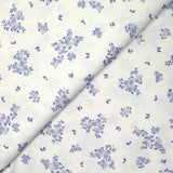 Coton imprimé petite brousse bleu fond blanc