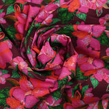 Cotton printed exotic flowers pink and green wine background