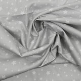 Piqué de coton imprimé étoiles fond gris