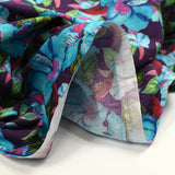 Cotton printed exotic flowers blue and green purple background