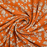 Off-white spring printed viscose with orange background