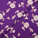 Brown ornamental printed cotton poplin with purple background