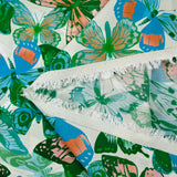 Viscose printed jacquard blue and green butterflies white background