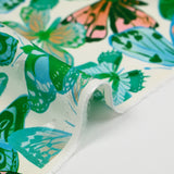 Viscose printed jacquard blue and green butterflies white background