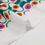 Viscose printed green and orange agitation white background