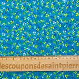 Cotton poplin printed yellow and blue bud with turquoise background