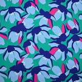 Cotton elastane satin blue flowers mint green background