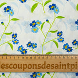 Cotton poplin printed blue flower and green stem sky background