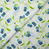 Cotton poplin printed blue flower and green stem sky background
