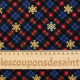 Cotton flannel printed with brown tartan and gold flakes