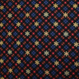 Cotton flannel printed with brown tartan and gold flakes