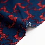 Flanelle de coton imprimée cerfs tartan rouge fond bleu marine