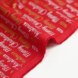 Popeline de coton imprimée Merry Christmas doré et argent fond rouge