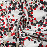 Cotton elastane satin in red bubbles white background