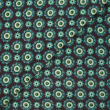 Cotton corduroy printed with turquoise rosettes and brown background