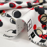 Cotton elastane satin in red bubbles white background