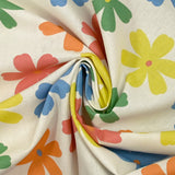 Cotton printed with Ninon flowers on an ecru background