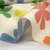 Cotton printed with Ninon flowers on an ecru background