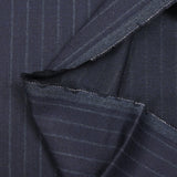 Striped wool blend flannel suit fabric with navy blue background