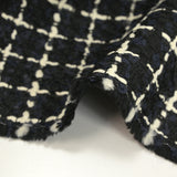 Tweed de laine mélangée à carreaux écru fond marine et noir