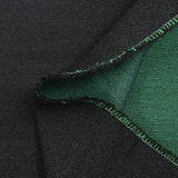 Elegante mezcla de lana texturizada en verde y negro.