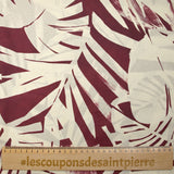 Cotton voile printed with traces of leaves, burgundy background