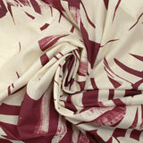 Cotton voile printed with traces of leaves, burgundy background