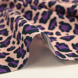 Cotton leopard print purple flesh pink background