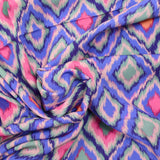 Green diamond printed viscose with purple background