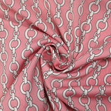 Satin de polyester léger imprimé maillons blanc fond rose