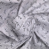 Striped printed polycotton poplin and branches gray background