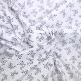Polycotton poplin printed navy bush white background