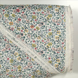 Coton imprimé Aurora fleurs rose et jaune fond blanc au mètre