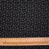 Polycotton poplin printed with flowers on black background
