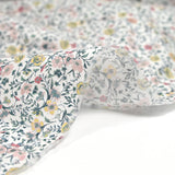 Coton imprimé Aurora fleurs rose et jaune fond blanc au mètre