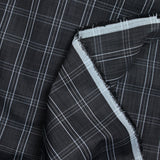 Dyed-woven polycotton poplin with large black background checks