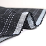 Dyed-woven polycotton poplin with large black background checks