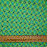 Popelín revestido estampado con flor de rombos, fondo verde limón