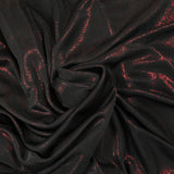 Fine red Lurex knit with black background