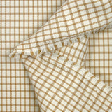 Polyester elastane with camel checkered off-white background
